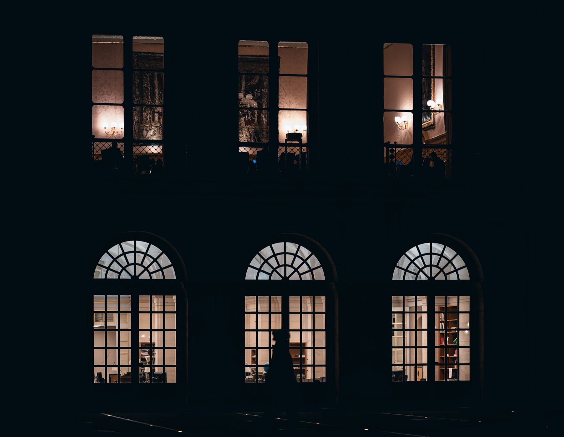 Lit windows of an office building at night